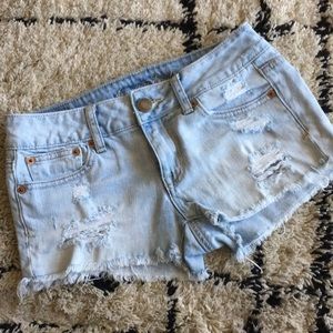 Distressed Stretch Denim Shorts